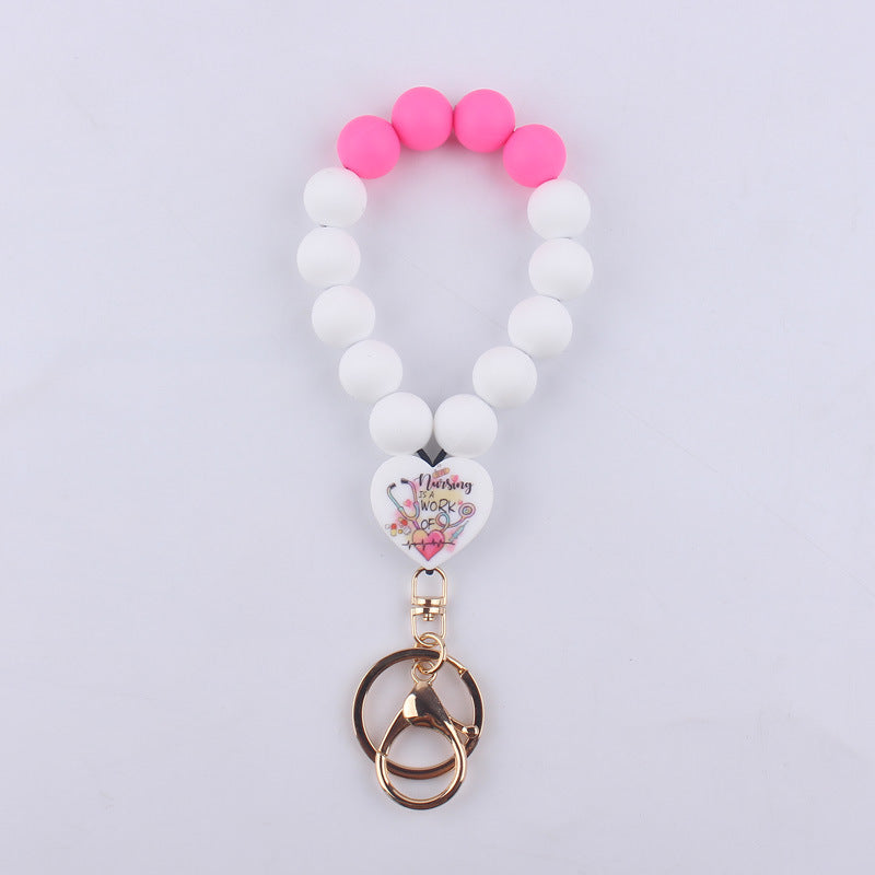 Wholesale Cartoon Love Printed Silicone Beaded Wrist Keychain